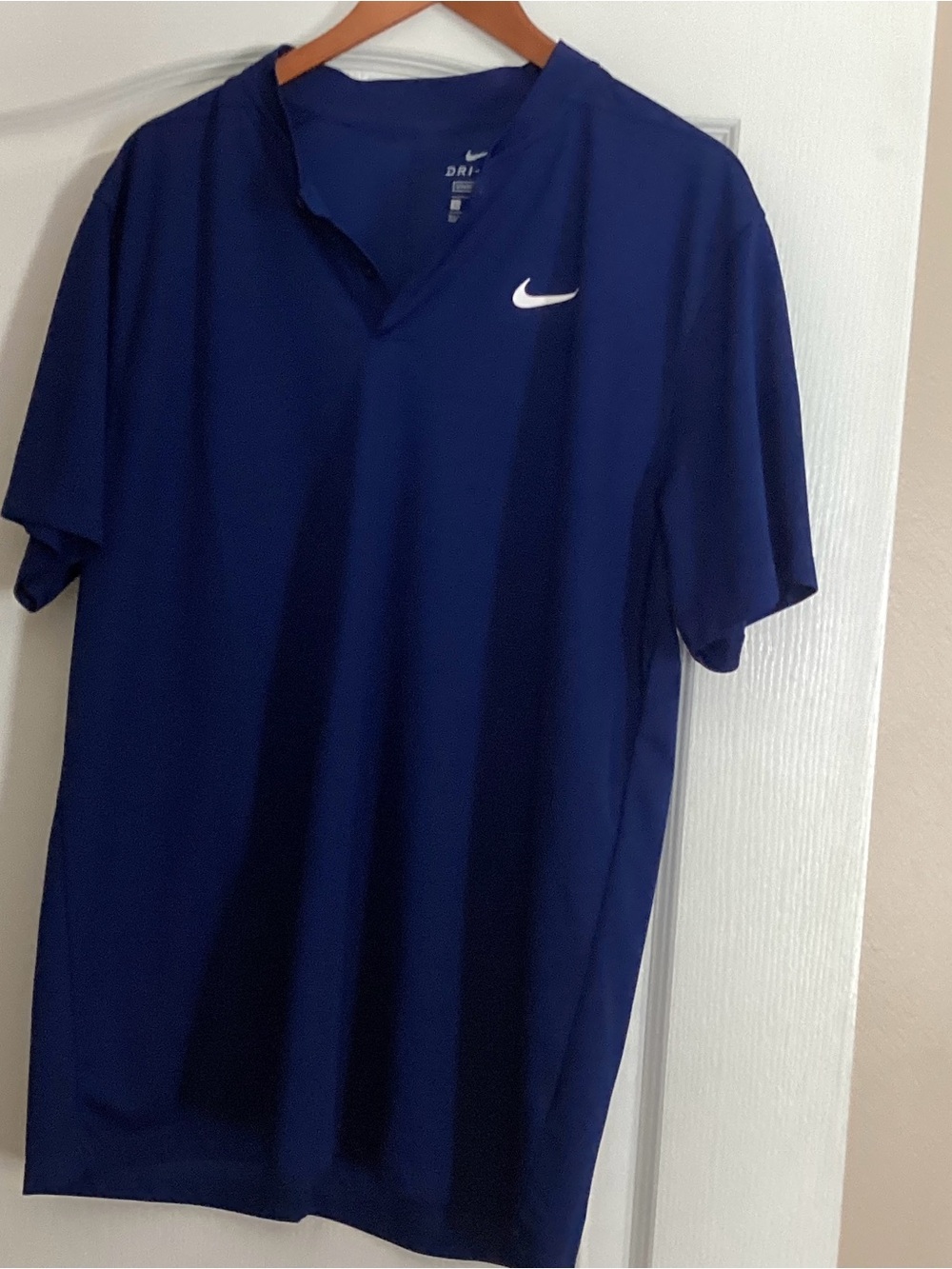 Nike Men’s Dri-FIT Polo in Dark Blue with White Swoosh